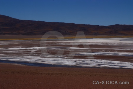 Altitude lake andes mountain salt flat.