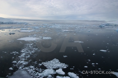 Antarctic peninsula gunnel channel reflection ice adelaide island.