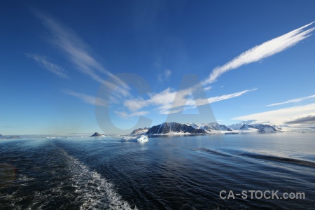 Antarctica cruise antarctica snowcap sky wake.