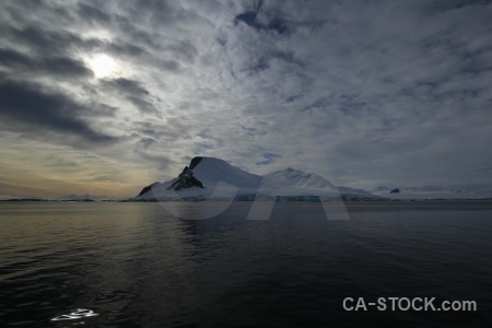 Antarctica cruise snow cloud sky landscape.