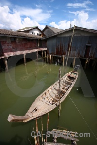 Asia vehicle water tropical stilts.