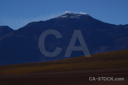 Atacama desert landscape volcano south america smoke.