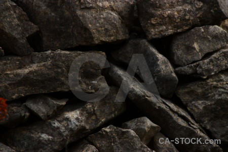 Black stone rock texture.