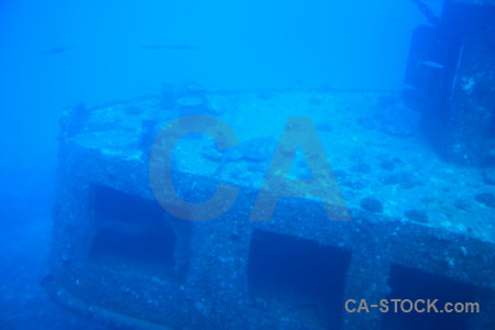 Blue cyan wreck underwater.