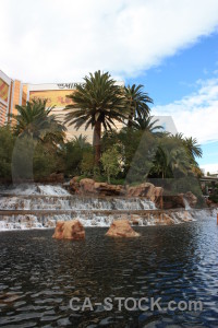 Blue fountain waterfall white pool.