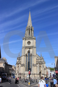 Blue person building church.