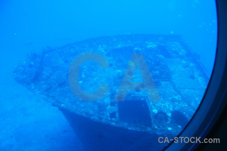 Blue underwater wreck.