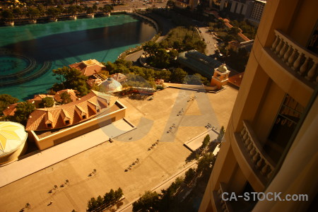 Brown cityscape orange fountain green.