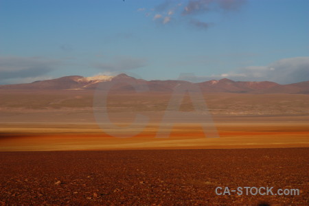 Brown landscape orange desert blue.