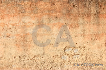 Brown plaster orange texture wall.