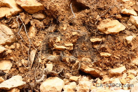 Brown rock orange texture stone.