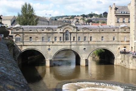 Building bridge white archway.