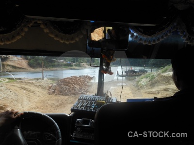 Bus inside southeast asia road water.