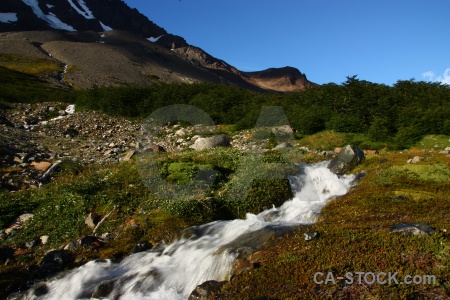 Chile stream rock torres del paine mountain.