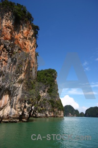 Cliff sky tree water thailand.