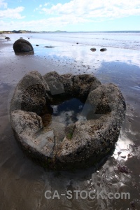 Cloud boulder new zealand koekohe beach water.