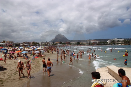 Cloud person beach arenal montgo.