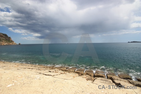 Cloud rock javea sky water.