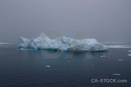 Cloud sea ice adelaide island antarctic peninsula water.