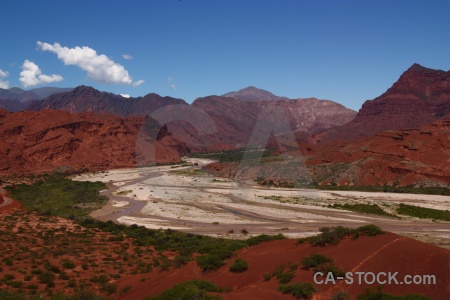 Cloud valley river bush landscape.