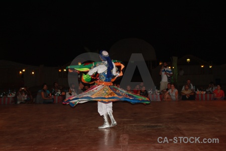 Costume dancing arabic spin person.