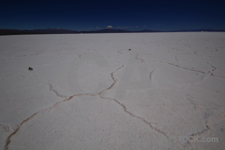 Crack salt flat sky andes south america.