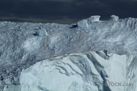 Day 5 iceberg cloud sky antarctica.