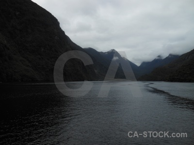 Doubtful sound fiordland cloud sky new zealand.