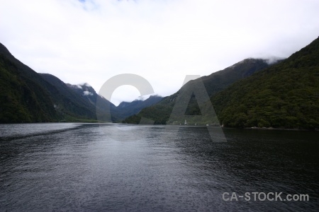 Doubtful sound mountain cloud fiord south island.