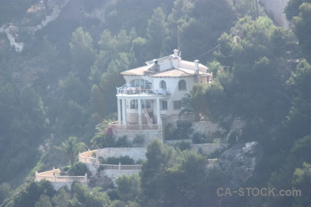 Europe spain cliff building tree.