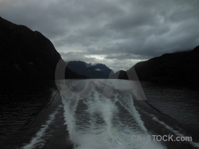 Fiordland mountain cloud wake south island.