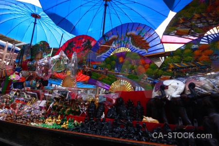 Floating market asia damnoen saduak umbrella.