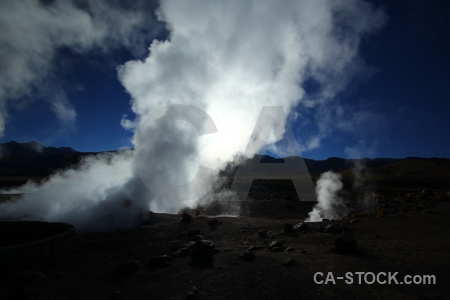 Geyser sun sky el tatio landscape.