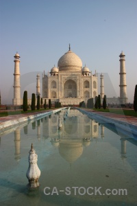 Grass mumtaz mahal dome minaret archway.