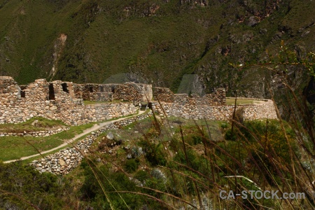 Grass stone south america inca ruin.