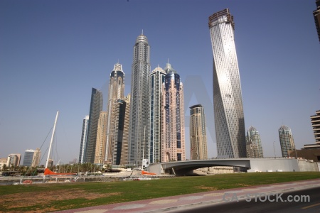 Grass uae western asia sky skyscraper.