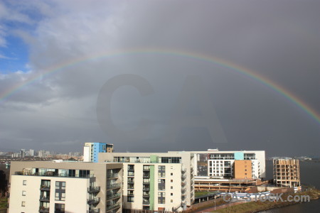 Gray sky cloud rainbow.