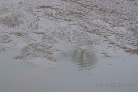 Gray surface mud water sea.