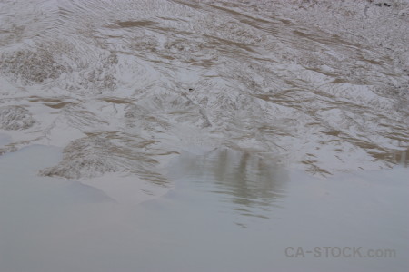 Gray water surface sea mud.