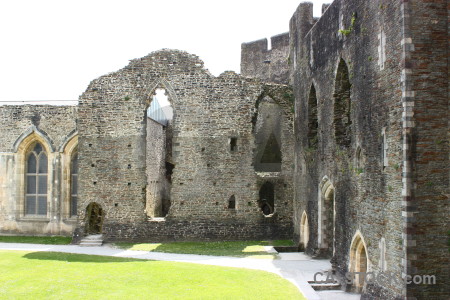 Green castle window white building.