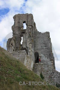 Green person castle building white.