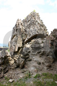 Green white rock cliff.