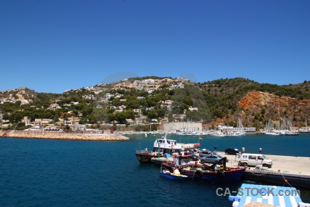 Harbour boat spain hill sea.