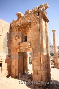 Historic stone block column sky.