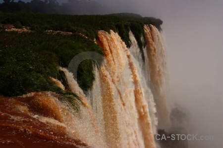 Iguassu falls water iguazu river spray argentina.