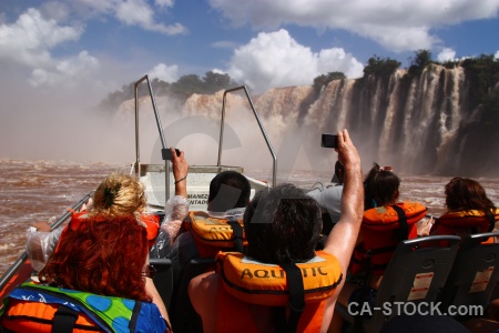 Iguazu falls cloud sky life jacket boat.