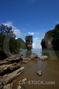 James bond rock limestone cloud water.