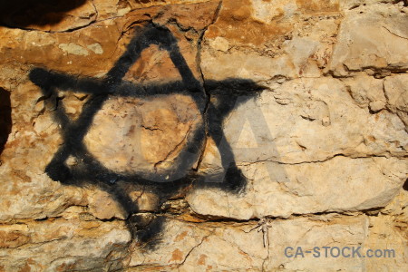 Javea rock orange spain hexagram.