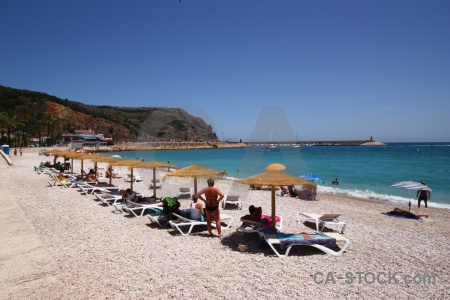 Javea sea umbrella beach stone.