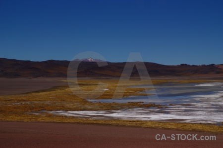 Lake altitude salt flat landscape water.